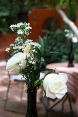 A coffee shop terrace with tables and chairs