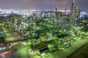 Fototapeta premium Nighttime Aerial View of Busy Refinery Complex