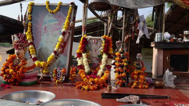 hindu holy bike god om banna worshiping at temple from flat angle