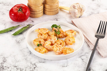 Stir fried prawn in sweet and sour sauce