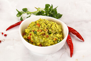 Guacamole with avocado, tomato and chili