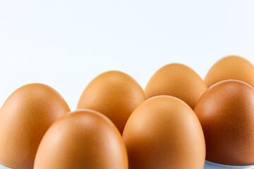 Eggs photographed in close up look artistic on a white isolated background