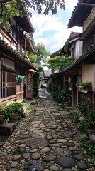 Fototapeta premium An old stone alley in Japan