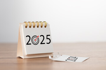 2025 Happy New year background. Turns over a calendar sheet. Setup objective target business cost...