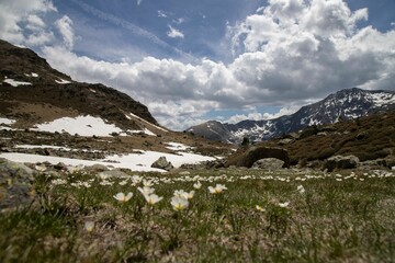 Fototapeta premium Scenic view of Tristaina Lakes in Andorra on a cloudy day