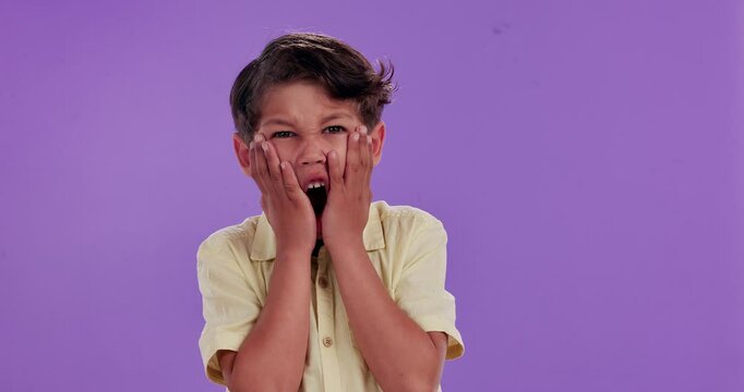 Wow, shock or child with hands on face in studio for news, information and unexpected announcement on purple background. Surprise, portrait or boy kid with emoji sign for oops, gossip or secret drama