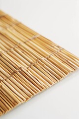 A close-up view of a bamboo mat on a table, great for highlighting textures and patterns