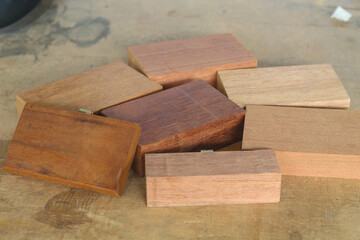 Pile of cut wooden blocks and planks, wood material