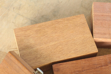 Pile of cut wooden blocks and planks, wood material