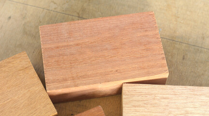 Pile of cut wooden blocks and planks, wood material