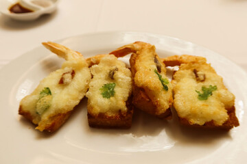 close up of Hong Kong Cantonese style deep fried prawn shrimp toast