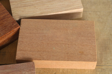 Pile of cut wooden blocks and planks, wood material