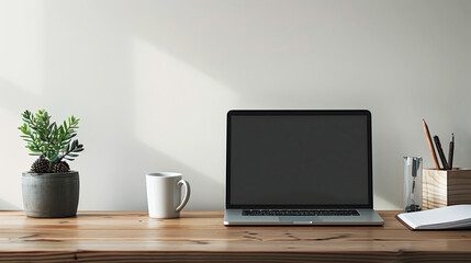 Minimalist desk setup with a laptop and coffee mug, ample copy space for banners.