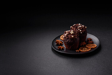 Delicious fresh muffins with filling and chocolate coating