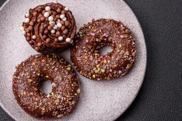 Delicious fresh donuts with filling and chocolate coating
