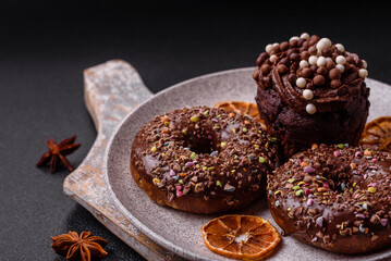 Delicious fresh donuts with filling and chocolate coating