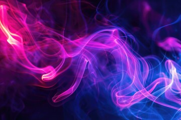 Fototapeta premium A close-up shot of pink and blue smoke swirling together, ideal for use in imagery related to relaxation, wellness, or scientific concepts