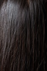 Fototapeta premium A close-up shot of a woman's long, dark hair