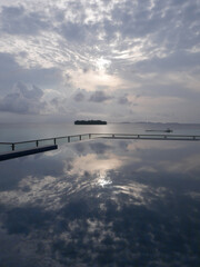 Paradise, Indonesia; February 14 2021: Pool overlooking paradise beach