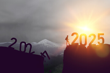 New year 2025 or straight forward concept. Text 2024 to 2025 written on the mountain top with at sunrise. Concept of planning, goal, challenge, new year resolution and start. High quality photo