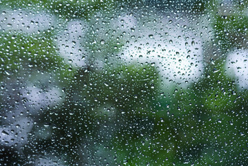 Macro Shot of Raindrop on Frosted Glass Window