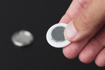 Changing battery in wireless tracker tag.