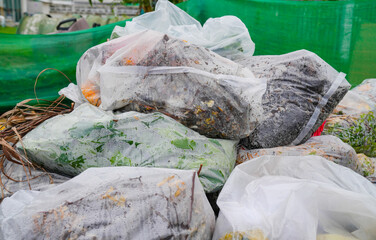 Garbage bags with packaging material