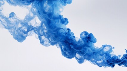 A mesmerizing macro photograph capturing the ethereal beauty of blue ink swirling and dissipating in water. The fluid forms and intricate patterns create a sense of wonder and mystery