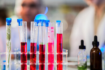 scientific tubes containing rare chemicals and exotic plant samples are used to extract substances for developing advanced medicines. scientist meticulously prepares for groundbreaking experiment.