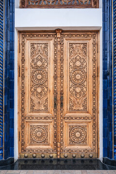 oriental Islamic pattern Uzbek traditional ornament on wooden carved door in the Museum of Political Repression in Tashkent