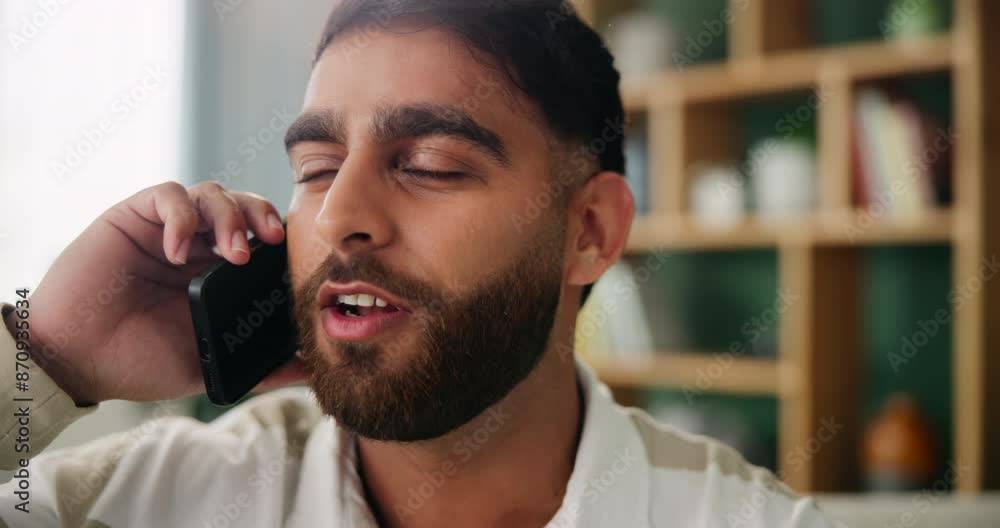 Poster Man, communication and talking for phone call on sofa with networking, connection and conversation in home. Indian guy, speaking and mobile hello in lounge for virtual chat, discussion and contact