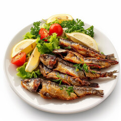 A delicious plate of Turkish hamsi tava, fried anchovies served with a side of fresh salad, garnished with lemon wedges, isolated on white background.