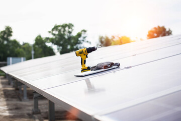 Engineer service check installation solar cell on the roof of factory , Sustainable energy industry concept, Renewable energy solution for climate change