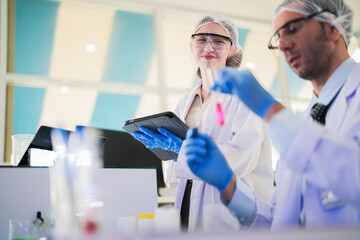 scientist doctors wear lab coat. Chemicals serums and antibiotics are being tested for treatment of people and animals. and make dietary supplements. product testing room clean in a modern laboratory.