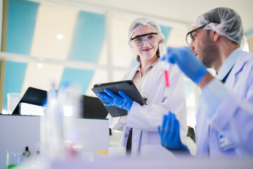 scientist doctors wear lab coat. Chemicals serums and antibiotics are being tested for treatment of people and animals. and make dietary supplements. product testing room clean in a modern laboratory.