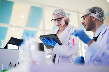 scientist doctors wear lab coat. Chemicals serums and antibiotics are being tested for treatment of people and animals. and make dietary supplements. product testing room clean in a modern laboratory.