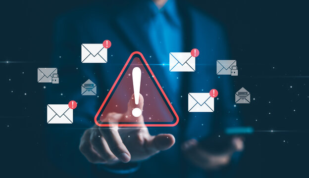 Email Security Warning Notification Concept. A businessman interacting with a digital screen showing email security alerts and warning notifications, cybersecurity threats. spam virus, junk mail, scam