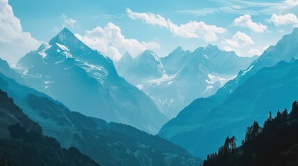 Serene mountain landscape with snow-capped peaks and clear skies