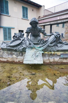 Laundress fountain in Umberto I square in Grassina, Tuscany, Italy