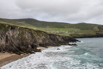 Scenic Coastal View With Rugged Cliffs and Rolling Hills in County Kerry, Ireland