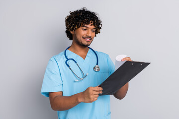 Photo of doc guy hold checklist read prescription isolated grey color background