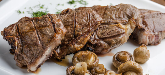 Bbq beef steaks - chateau mignon, t-bone, tomahawk, striploin, tenderloin, new york steak.