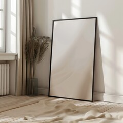 Blank picture frame with sunlight and shadows