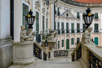 Balcony and facade of the baroque style Eszterházy Palace in Fertőd, Hungary with stone...