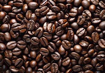 Naklejka premium Roasted brown coffee beans with a rich aroma, perfect for a morning beverage.