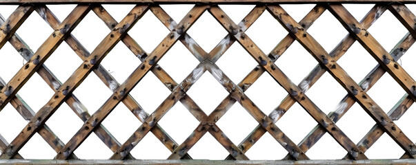 A close-up image of a wooden lattice fence with a small plant growing on the right side, providing a natural and rustic gardening scene.