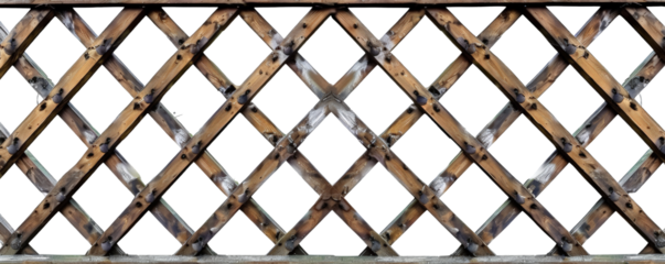A close-up image of a wooden lattice fence with a small plant growing on the right side, providing a natural and rustic gardening scene.