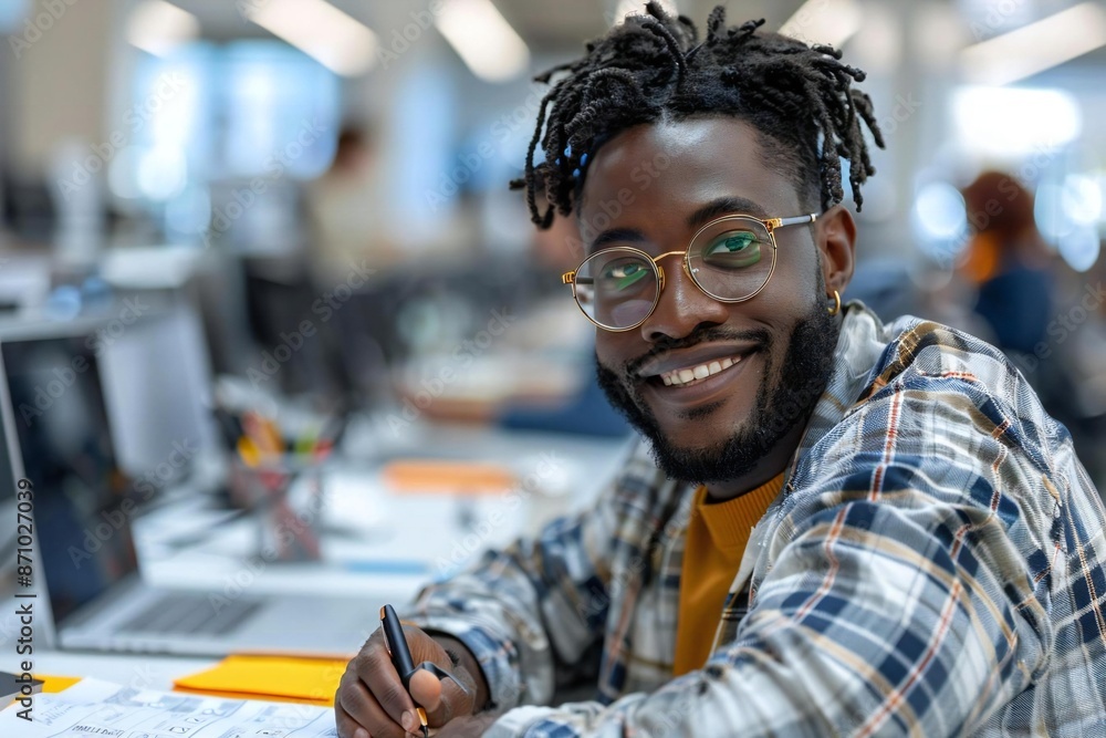 Aufkleber beautiful person with eyeglasses and a well-groomed beard is smiling and marking a checklist with a pen in an office setting.