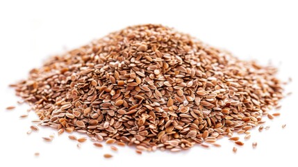 A pile of flax seeds on a white surface