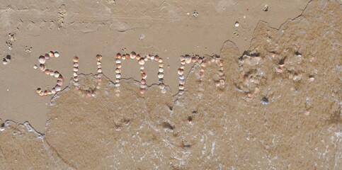 Summer Word on Sand made of Seashells